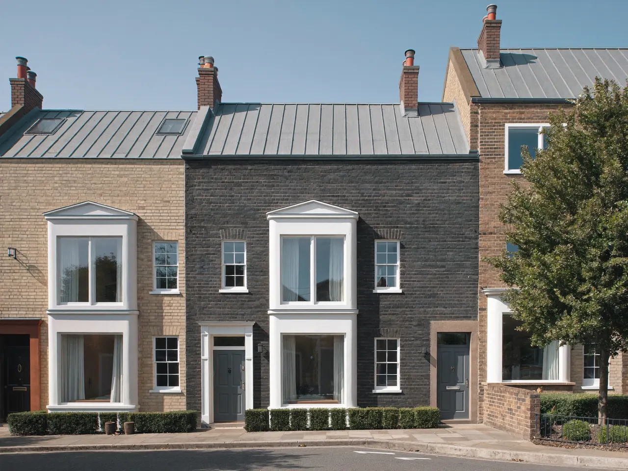 Row of UK terraced houses fitted with smart new double-glazed windows